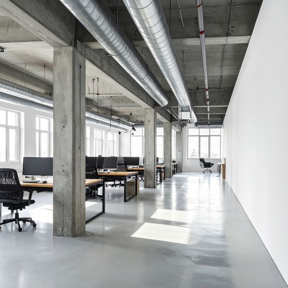 Exposed ventilation ducts in a commercial workspace